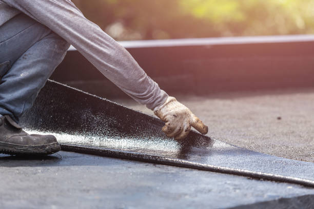 Professional Basement Waterproofing technician working in Universal, IN
